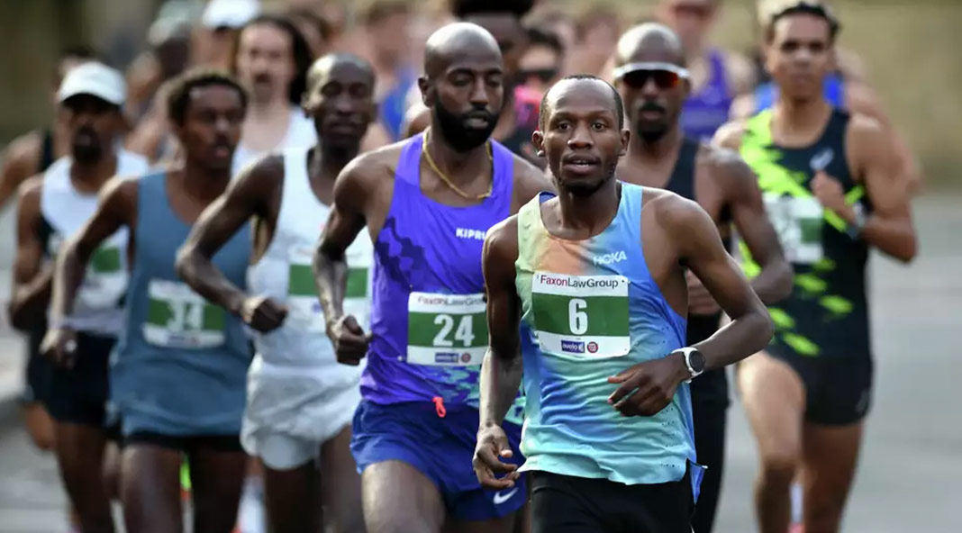 Hillary Bor, center, leads at the start of the 47th Annual Faxon Law New Haven Road Race 20K in New Haven on September 2, 2024 where he finished first.