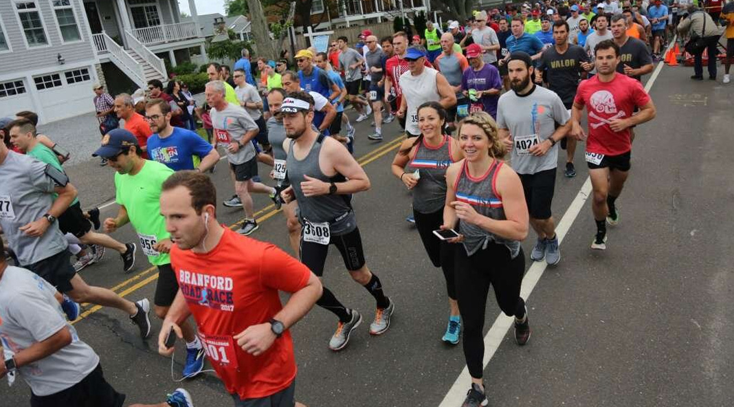 Runners having fun at the Fairfield Road Race